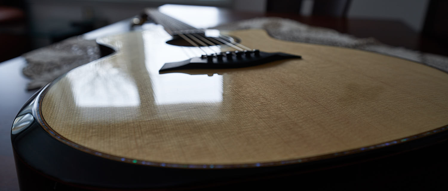 Guitar reflecting light like our blog reflecting opinions and info music related.